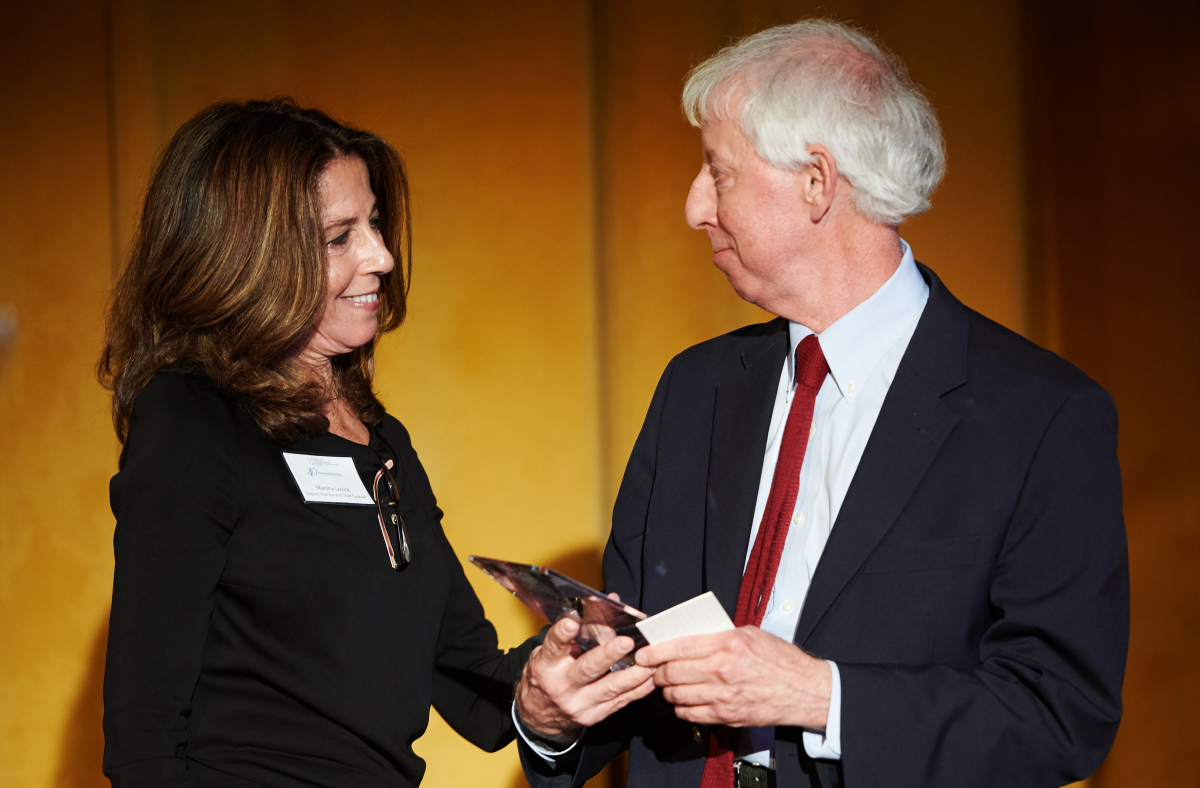 Marsha Levick presenting Bob Schwartz with inaugural Leadership Prize in 2015.